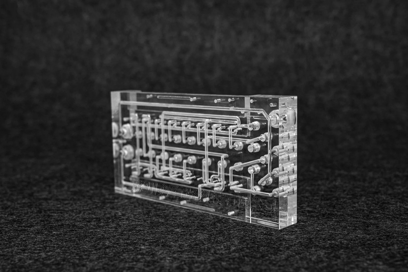 Transparent PMMA microfluidic chip with precision machined channels