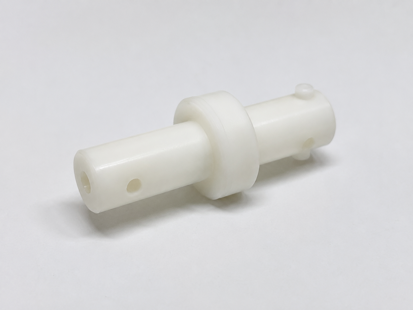Finished CNC machined POM spool component